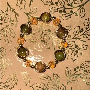 Elegant Gold and Green Bracelet